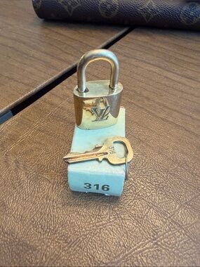 Louis Vuitton Gold Padlock and Key Set with LV Monogram